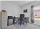 Bright office space featuring a black desk, rolling chair, and plenty of natural light at 366 Fennec Loop, Conway, SC 29526