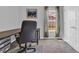 Comfortable office with black rolling chair, desk, storage drawers, and bright window at 366 Fennec Loop, Conway, SC 29526