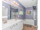 This is a spacious bathroom featuring a double vanity, soaking tub, and separate shower at 3907 Club Course Dr., North Myrtle Beach, SC 29582