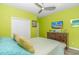 Bright bedroom featuring hardwood floors, a ceiling fan, and a TV at 3907 Club Course Dr., North Myrtle Beach, SC 29582