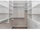 Walk-in closet with shelving, rods and drawers at 3907 Club Course Dr., North Myrtle Beach, SC 29582