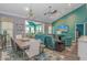 Dining room open to the living room features vaulted ceilings and lots of natural light for a spacious feel at 3907 Club Course Dr., North Myrtle Beach, SC 29582