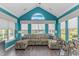 Bright living room with vaulted ceiling and view of the pool at 3907 Club Course Dr., North Myrtle Beach, SC 29582