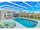 Inviting in-ground pool with screened enclosure at 3907 Club Course Dr., North Myrtle Beach, SC 29582