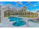 Inviting in-ground pool and spa with screened enclosure at 3907 Club Course Dr., North Myrtle Beach, SC 29582