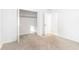 Bright bedroom featuring a closet with ample storage space, and neutral carpet flooring at 404 75Th Ave N # G, Myrtle Beach, SC 29572