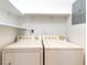 Efficient laundry area equipped with a washer and dryer, providing convenience for household tasks at 404 75Th Ave N # G, Myrtle Beach, SC 29572