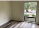 Bright bedroom featuring wide windows with a view and stylish, modern flooring at 409 Salt Marsh Circle # 20C, Pawleys Island, SC 29585
