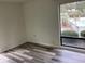 Bright bedroom featuring wide windows with a view and stylish, modern flooring at 409 Salt Marsh Circle # 20C, Pawleys Island, SC 29585
