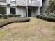 Well-maintained condo with green landscaping around the building at 409 Salt Marsh Circle # 20C, Pawleys Island, SC 29585