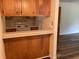 Bright kitchen with a breakfast bar and easy access to other living spaces at 409 Salt Marsh Circle # 20C, Pawleys Island, SC 29585