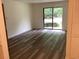 Spacious living room with abundant natural light and access to the outdoors at 409 Salt Marsh Circle # 20C, Pawleys Island, SC 29585