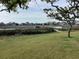 Beautiful backyard water view with wooden dock at 409 Salt Marsh Circle # 20C, Pawleys Island, SC 29585
