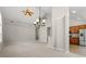 Inviting living area featuring vaulted ceiling, carpet, and open floor plan at 4165 Eva Bay Dr., Murrells Inlet, SC 29576