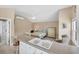 Combination bedroom and kitchen features a vaulted ceiling and a ceiling fan at 4204 N Ocean Blvd., Myrtle Beach, SC 29577