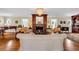 Elegant living room featuring a decorative fireplace, hardwood floors, and a chandelier at 4204 N Ocean Blvd., Myrtle Beach, SC 29577