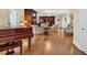 Spacious living area with hardwood floors, piano, and elegant decor at 4204 N Ocean Blvd., Myrtle Beach, SC 29577