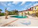 Private pool featuring a dolphin mosaic and a sculpture next to the main house and lounge chairs at 4204 N Ocean Blvd., Myrtle Beach, SC 29577