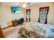 Bedroom with ceiling fan and TV offers a comfortable space for relaxing and entertainment at 4391 Party Pines Rd., Conway, SC 29526
