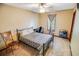 Comfortable bedroom with a ceiling fan, lots of light, and a cozy bed at 4391 Party Pines Rd., Conway, SC 29526