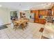 Spacious dining area featuring an adjacent stainless steel refrigerator, with view to front rooms at 4391 Party Pines Rd., Conway, SC 29526