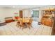 Open-concept kitchen featuring an adjacent dining area with a wooden table and chairs at 4391 Party Pines Rd., Conway, SC 29526