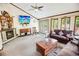 Comfortable living room with a fireplace, flat-screen TV, and a rocking chair at 4391 Party Pines Rd., Conway, SC 29526