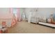 Bright and charming Bedroom with a play tent, crib, and decor, creating a cozy and inviting space at 4425 Honir Dr., Myrtle Beach, SC 29579