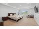 Bright bedroom with trey ceilings and a queen bed, offering a relaxing and inviting space at 4425 Honir Dr., Myrtle Beach, SC 29579