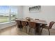 Elegant dining room features a wooden table and large window, perfect for Gathering gatherings at 4425 Honir Dr., Myrtle Beach, SC 29579