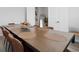 Spacious dining room with seating for eight, showcasing modern decor and ample natural light at 4425 Honir Dr., Myrtle Beach, SC 29579