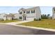 Inviting home with a two-car garage, lush lawn, and landscaped garden offering great curb appeal at 4425 Honir Dr., Myrtle Beach, SC 29579