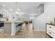 Modern kitchen featuring a central island with bar stools, stainless appliances, and an open floor plan at 4425 Honir Dr., Myrtle Beach, SC 29579