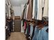 Spacious walk-in closet with ample hanging space and shelving for optimal organization and storage capabilities at 4425 Honir Dr., Myrtle Beach, SC 29579