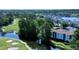 Stunning aerial view of golf course and waterfront condos amidst lush green landscape at 4449 Turtle Ln. # 3A, Little River, SC 29566