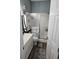 Bathroom featuring shower with sliding glass doors, a toilet, and vanity with storage at 4449 Turtle Ln. # 3A, Little River, SC 29566