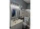 Cozy bathroom features a vanity with storage and a shower with sliding glass doors at 4449 Turtle Ln. # 3A, Little River, SC 29566