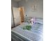 Charming bedroom with nautical decor, comfortable bedding, and a view into the hallway at 4449 Turtle Ln. # 3A, Little River, SC 29566