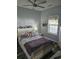 Cozy bedroom with soft lighting, comfortable bed with soft bedding, and a window letting in natural light at 4449 Turtle Ln. # 3A, Little River, SC 29566