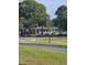 Beautiful clubhouse surrounded by lush green trees and manicured lawns at 4449 Turtle Ln. # 3A, Little River, NC 29566