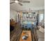 Open-concept living space featuring a dining area with seating for six and views into the kitchen at 4449 Turtle Ln. # 3A, Little River, SC 29566