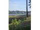 Picturesque water view of the community with waterfront homes and docks at 4449 Turtle Ln. # 3A, Little River, NC 29566