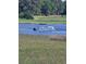 Enjoy a beautiful waterfront property with a pontoon boat and golf course views at 4449 Turtle Ln. # 3A, Little River, SC 29566