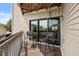 The private balcony has two chairs and views of the outside at 4500 S Ocean Blvd. # 4, North Myrtle Beach, SC 29582