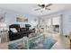 Inviting living room with a plush sofa, recliner, and access to a balcony, offering a relaxing atmosphere at 4500 S Ocean Blvd. # 4, North Myrtle Beach, SC 29582