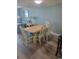 Comfortable dining area with a table and seating for six, open to the living space at 4800 S Ocean Blvd. # 1402, North Myrtle Beach, SC 29582