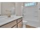 Well-lit bathroom featuring a tub and vanity with modern fixtures at 489 Rose Fountain Dr., Myrtle Beach, SC 29579
