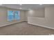 Versatile bonus room with carpet, neutral walls, and a window at 489 Rose Fountain Dr., Myrtle Beach, SC 29579
