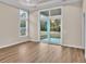 Spacious living area with large windows and sliding glass doors to patio for indoor/outdoor living at 489 Rose Fountain Dr., Myrtle Beach, SC 29579