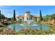 Beautiful pond with a fountain surrounded by colorful flowers and a gazebo in the community at 489 Rose Fountain Dr., Myrtle Beach, SC 29579